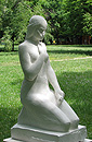 Sculpture of a woman on her knees